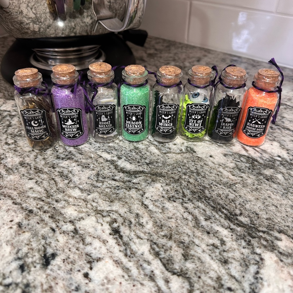 Set of Eight Colorful Potion Bottles